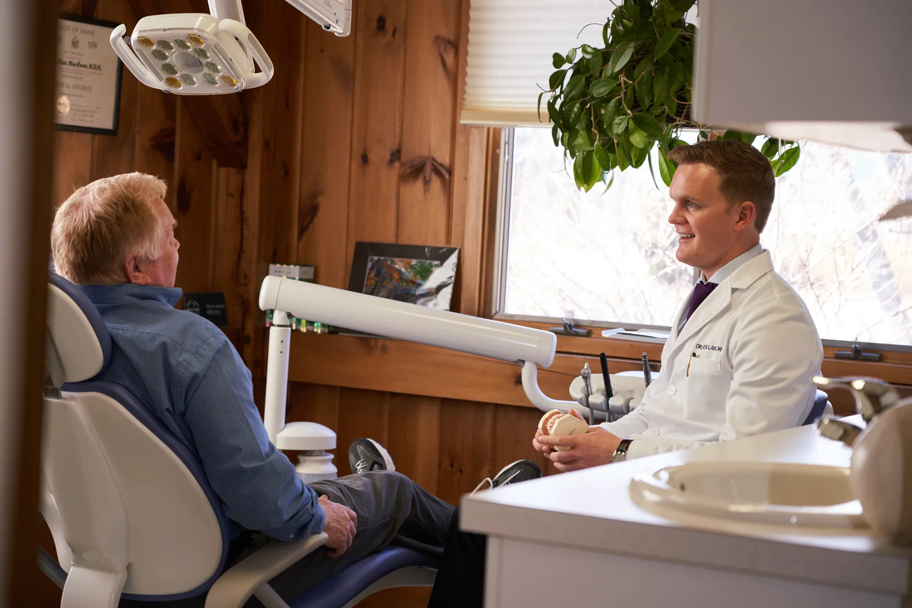 Dr. Lawlor consulting with a patient at Maine Dentistry