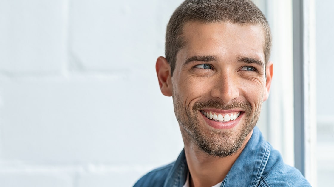 Man Smiling After Fillings